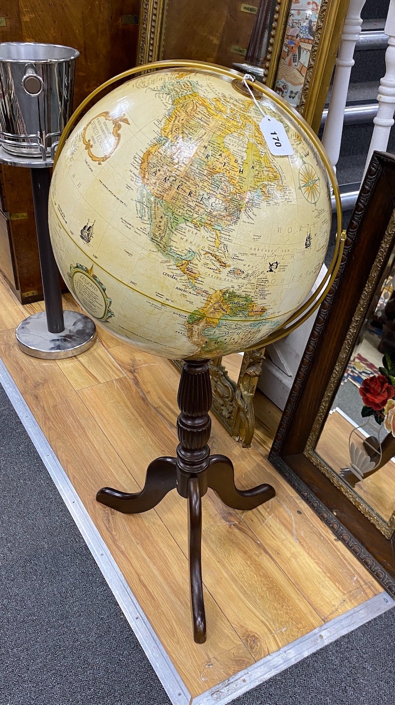 A Replogle 16inch terrestrial globe on tripod stand height 97cm.